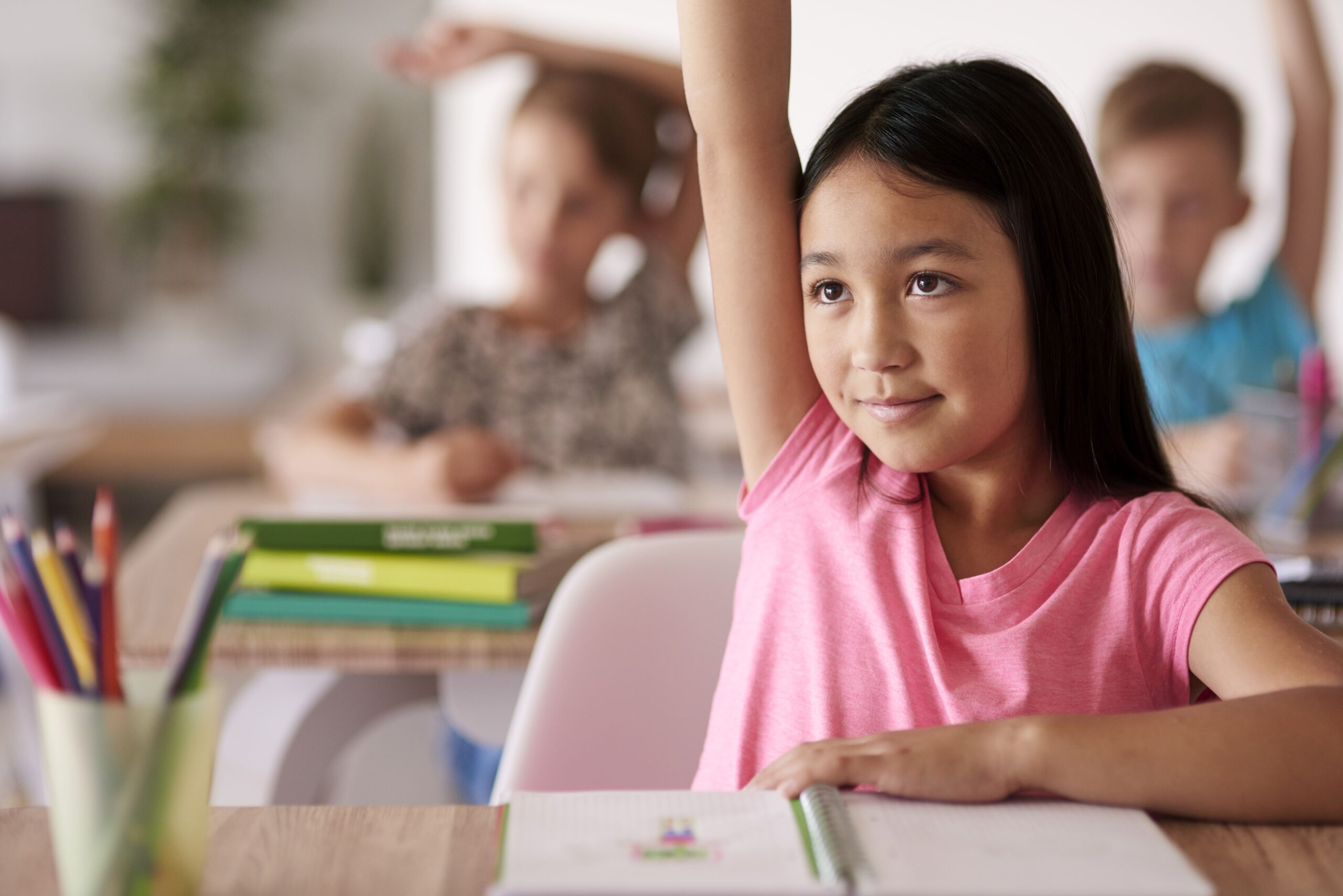 teenage student raising hand classroom (2)